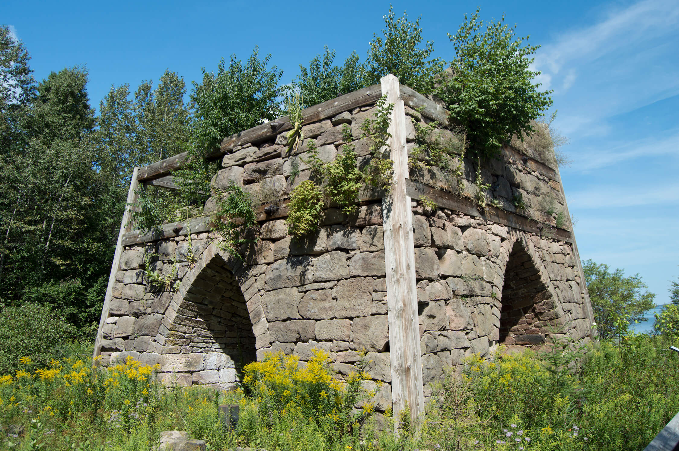 Close view of restored Bay Furnace with vegetation.