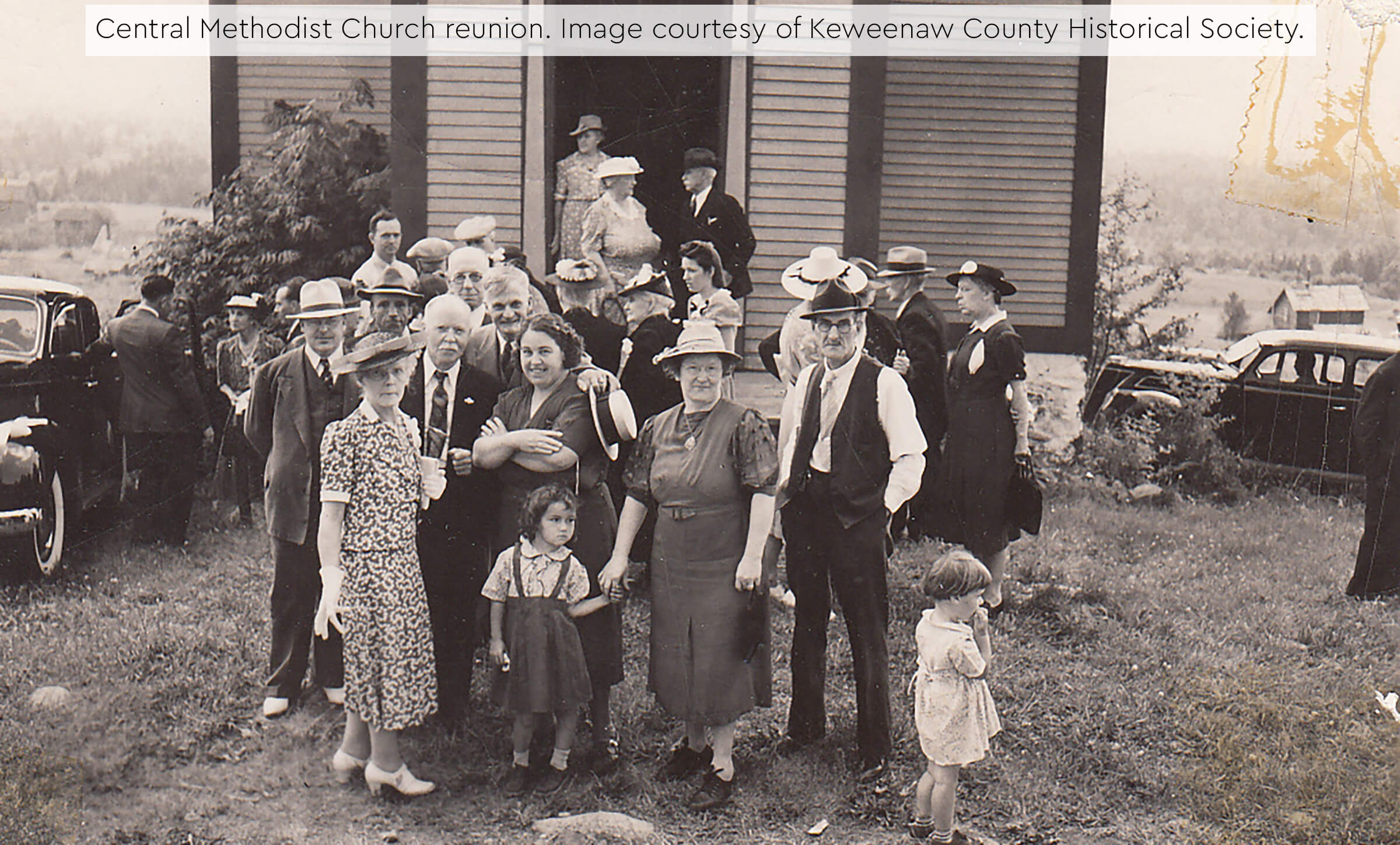 A group of people gathered outside the Central Methodist Church.