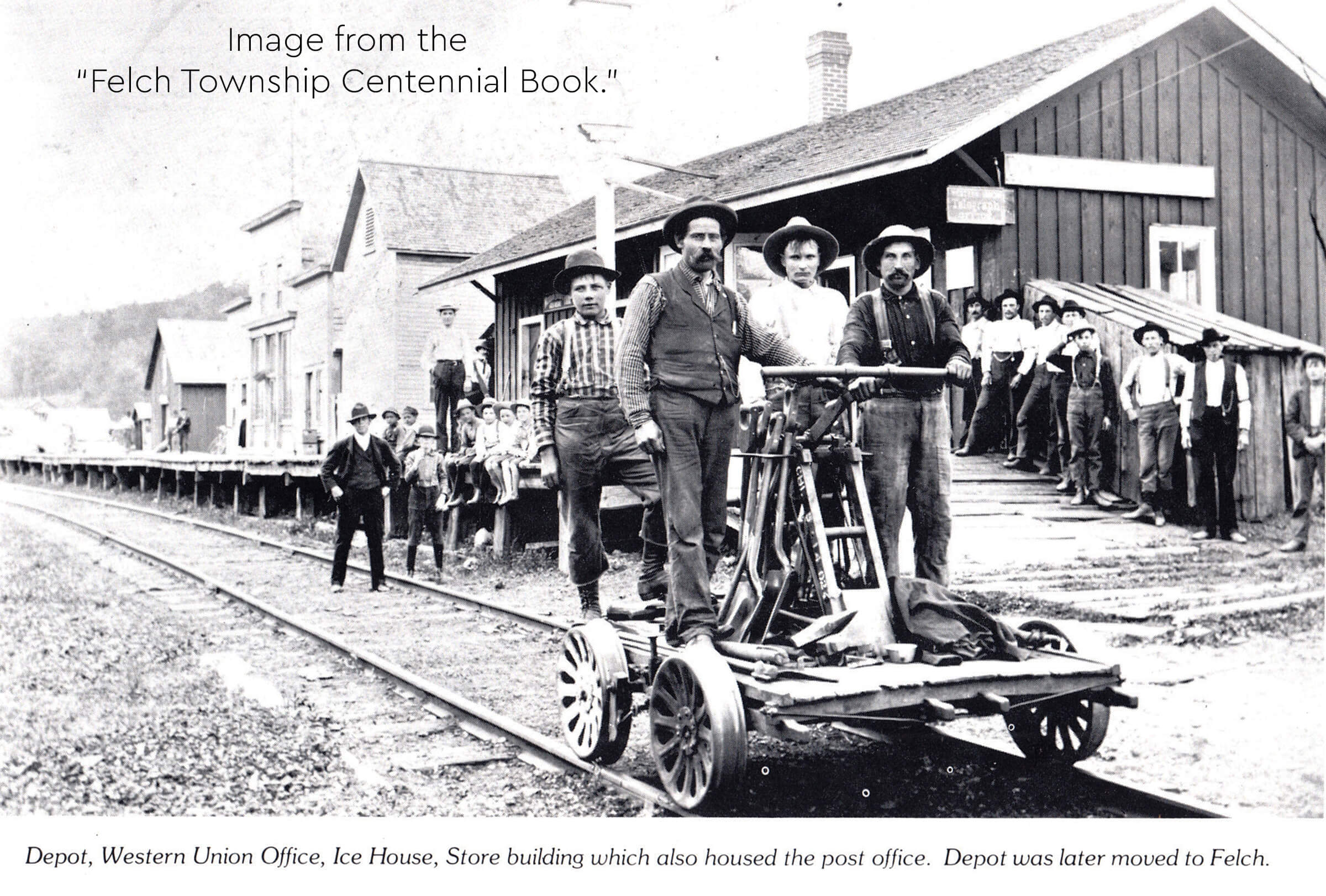 Handcar crew and townsfolk at Metropolitan depot.