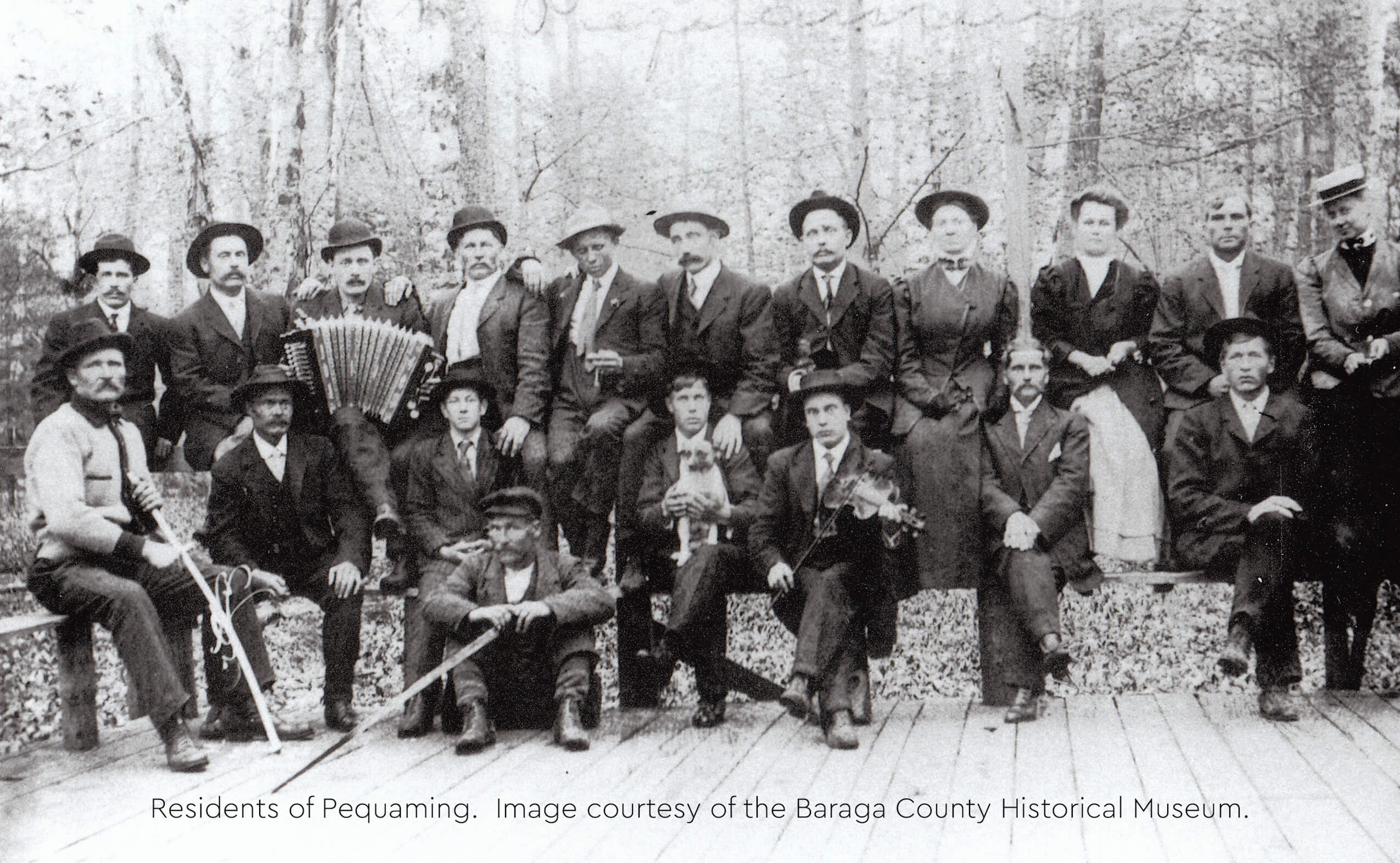 Historical photograph of Pequaming residents in formal attire