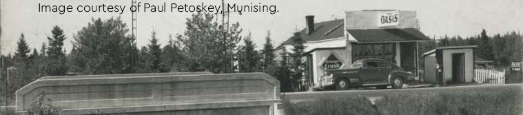 Historic 1948 image of The Oasis in Walsh, showing a gas station and car.