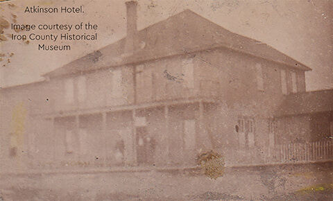 A historical photograph of the Atkinson Hotel.