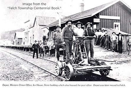 Handcar crew and townsfolk at Metropolitan depot.