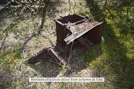 Rusting remains of a cook stove from a former home in Tula, Michigan.