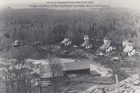 Historic aerial view of Victoria houses and buildings from a mine rock pile.