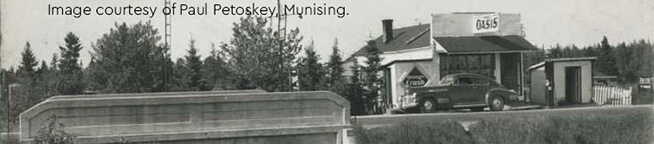 Historic 1948 image of The Oasis in Walsh, showing a gas station and car.