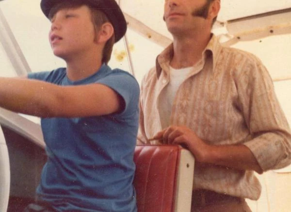 Benjamin Houghton & son David boating.