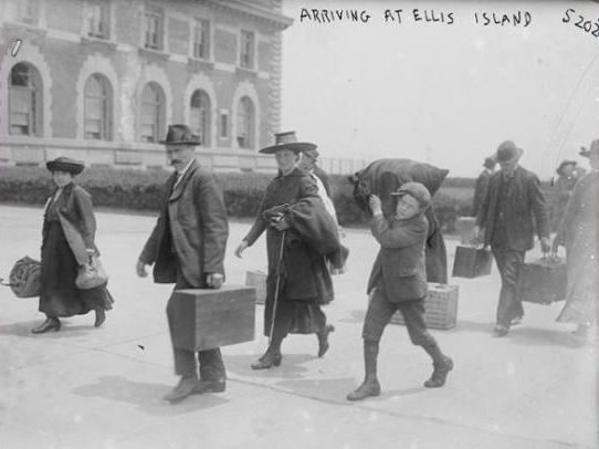 Immigrants arriving at Ellis Island.
